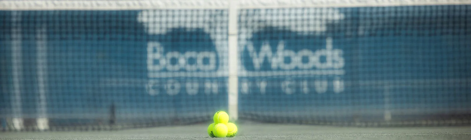 Tennis balls on court at Boca Woods Country Club in Boca Raton, FL
